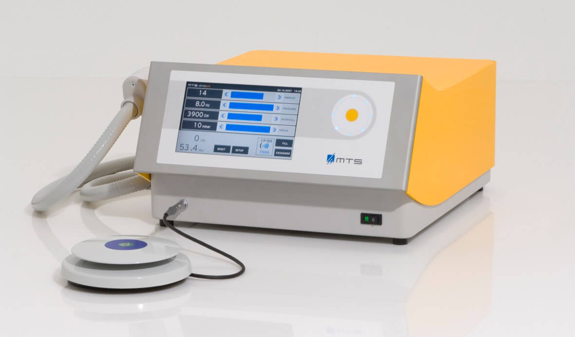 How does the acoustic wave therapy machine work